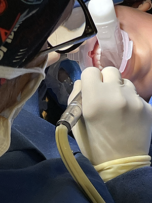 6-year-old patient during dental surgery with Zyris ORA in use.